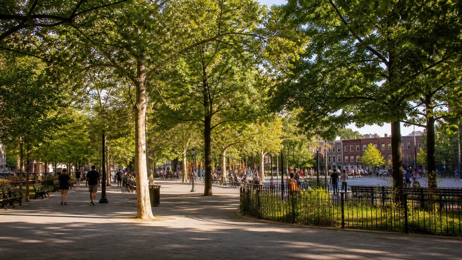 Tree-lined paths and active central space in Maria Hernandez Park in Bushwick